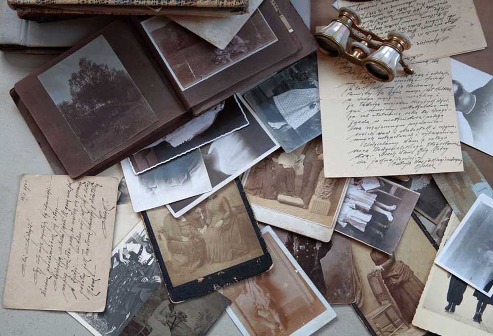 pile of old photos and letters